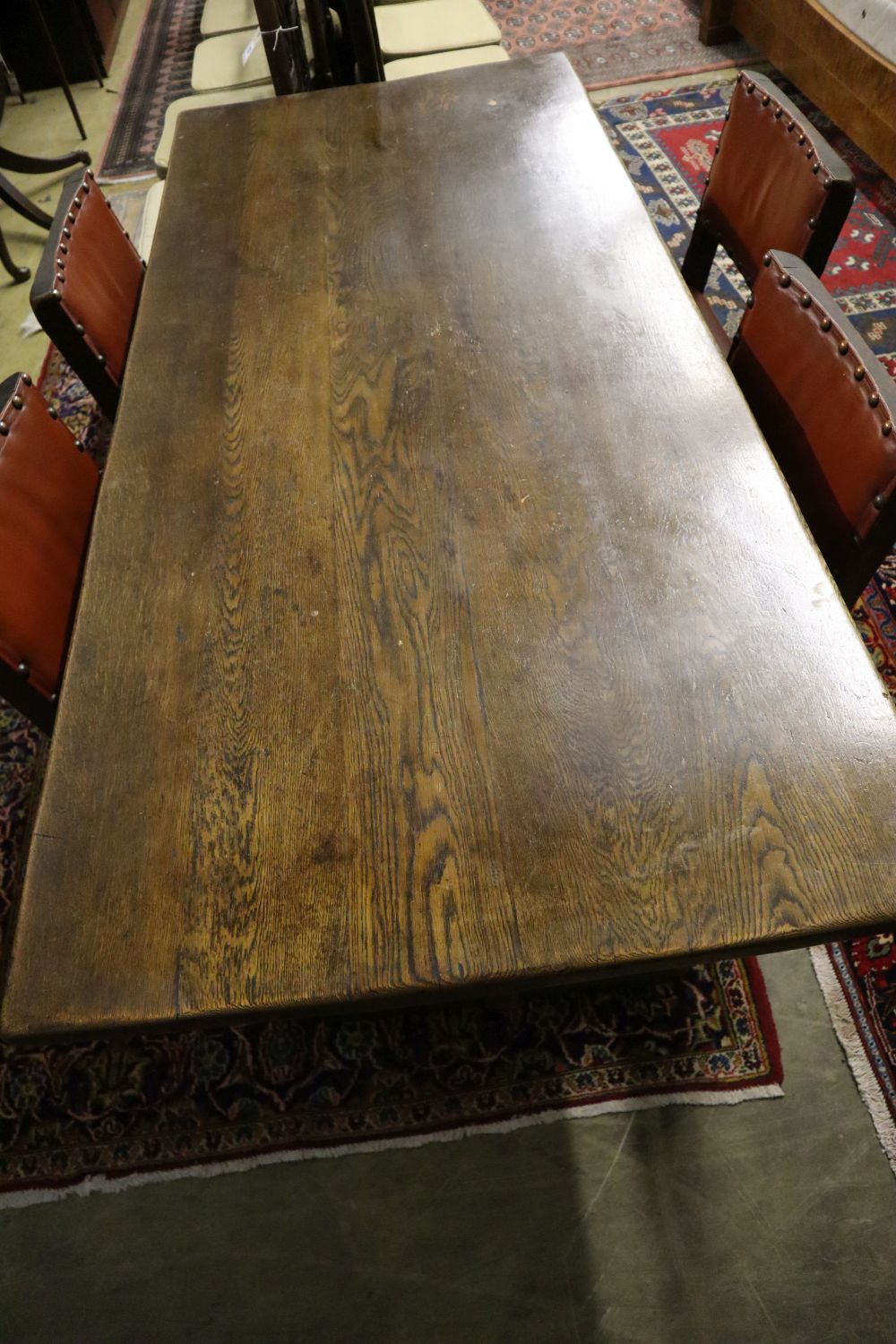 An 18th century-style oak refectory dining table, sideboard and four chairs, table 182 x 79cm height 76cm